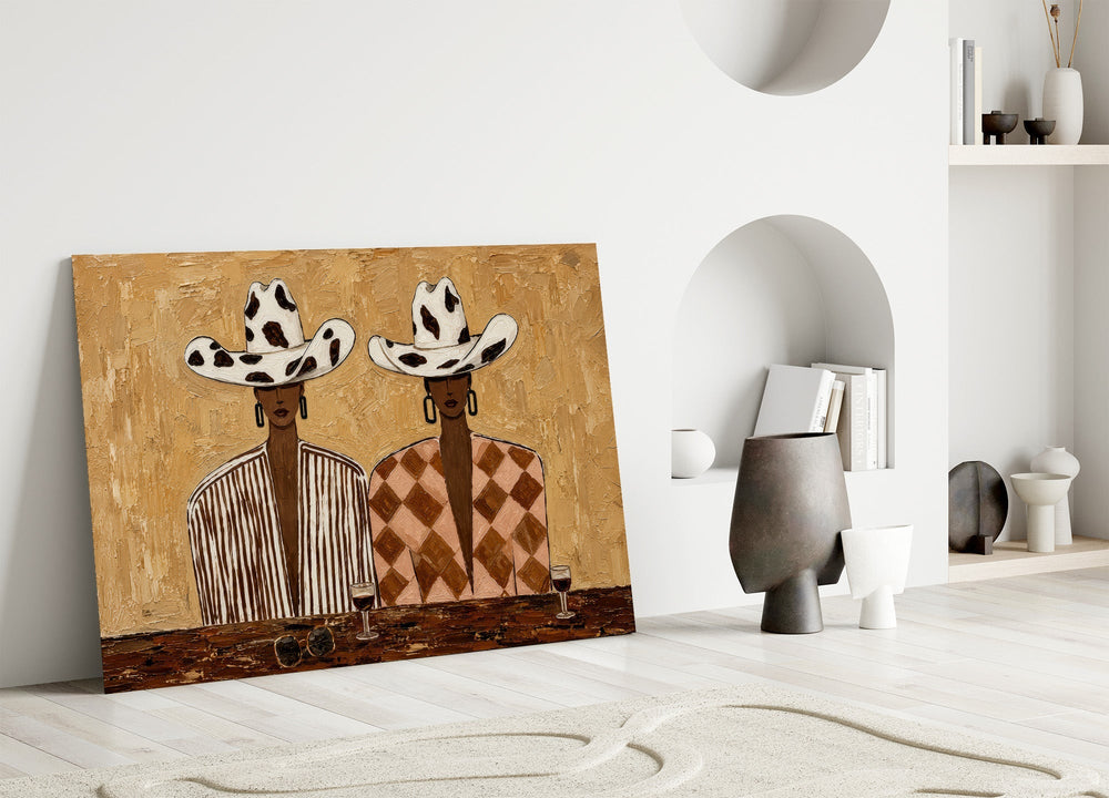 Cowgirl Duo Cow-Print Hats Warm Tones Glass Wall Art
