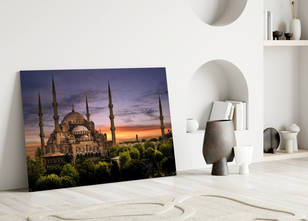 Blue Mosque glass wall art styled above a sofa in a cultural living room