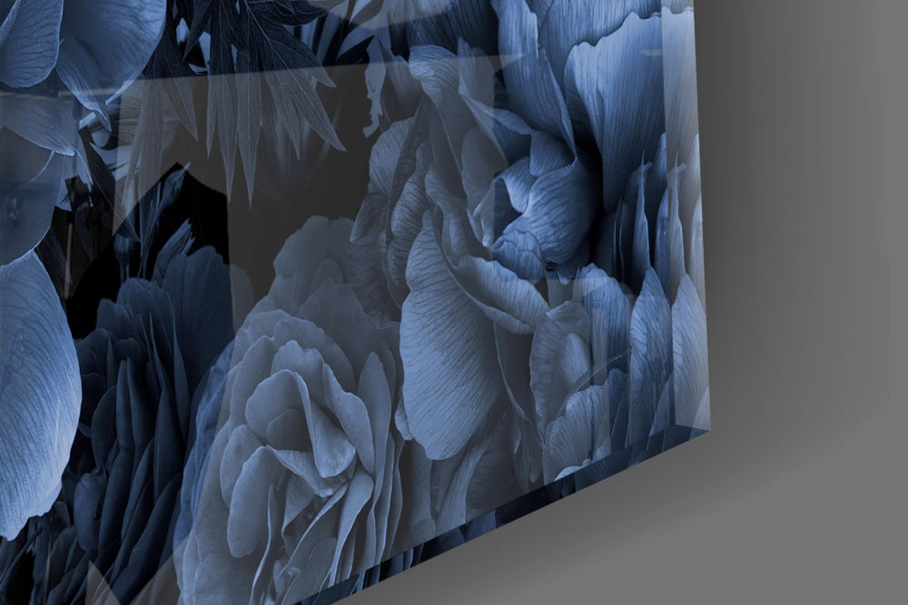 Indigo-on-black rose bouquet glass wall art in boutique-hotel suite