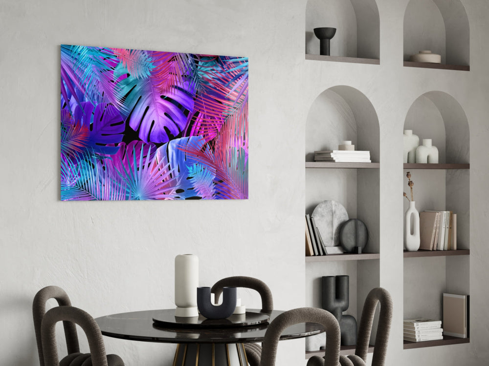 Stage-lit neon-jungle glass wall art over master-bedroom headboard