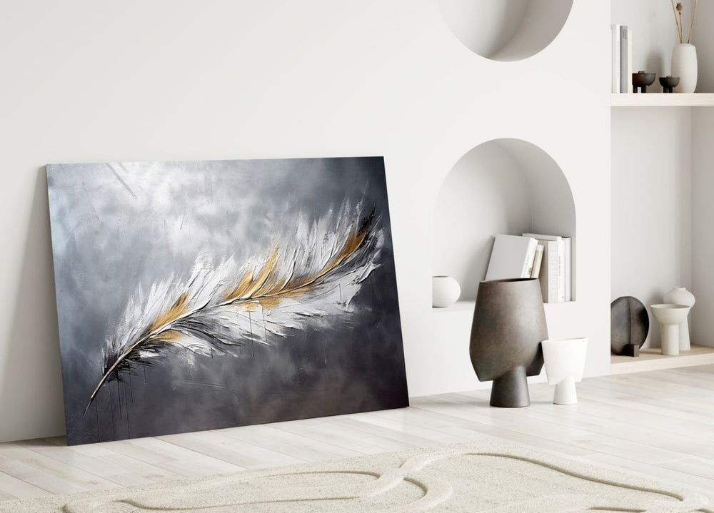 Single-feather painterly glass wall art over linen sofa in designer lounge