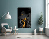 Gold-accent B&W portrait cinematic glass wall art over walnut console