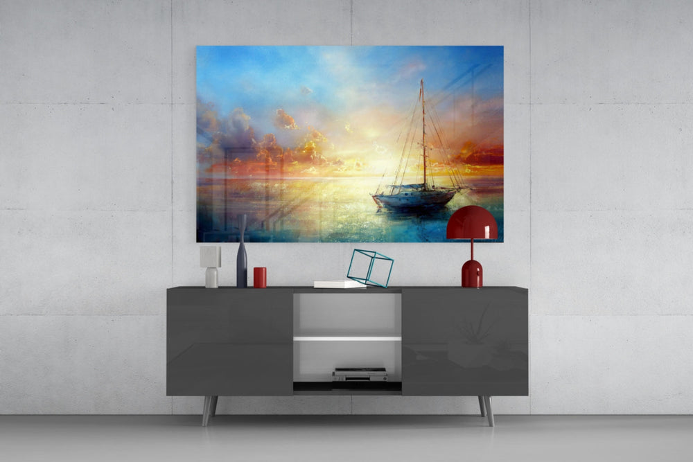 Painterly sunset sailboat glass wall art in resort suite living room