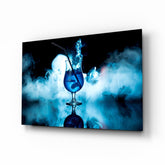 Blue cocktail smoke captured-fluid cinematic glass wall art above home bar back-counter