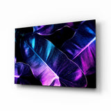Glowing neon leaves cinematic glass wall art above black media console