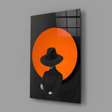 Graphic-pop fedora silhouette cinematic glass wall art in boutique-hotel lounge
