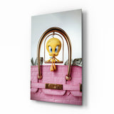Tweety in pink Birkin cinematic glass wall art over walnut console in designer fashion atelier