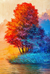Colorful trees by a body of water with a gradient sky.