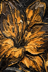 Close-up of a textured surface with floral patterns in brown and black.