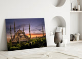 Blue Mosque glass wall art styled above a sofa in a cultural living room
