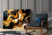 Navy-and-gold alcohol-ink glass wall art over modern dining table