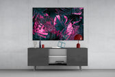 Stage-lit tropical leaf glass wall art in nightclub-style home bar