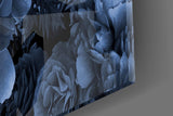 Indigo-on-black rose bouquet glass wall art in boutique-hotel suite