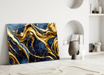 Indigo-and-gold-vein marble cinematic glass wall art over master-bedroom headboard