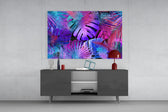 Backlit tropical-leaf cinematic glass wall art in nightclub-style home bar