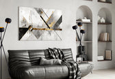 Geometric gold-line abstract glass wall art over master-bedroom headboard