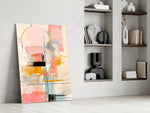 Tangerine-and-ivory cinematic glass wall art in hospitality lounge