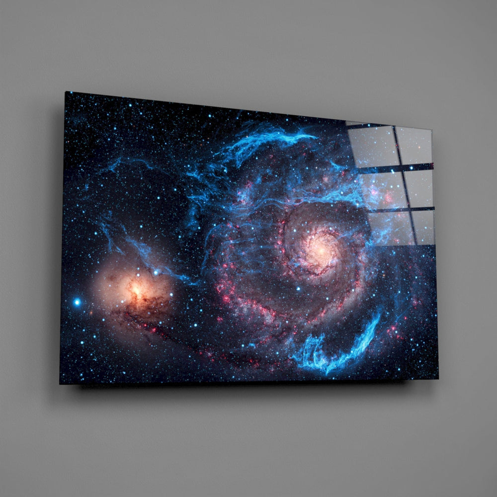 Hubble-archive cosmic glass wall art over modern desk in tech-firm office