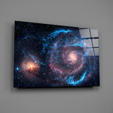 Hubble-archive cosmic glass wall art over modern desk in tech-firm office