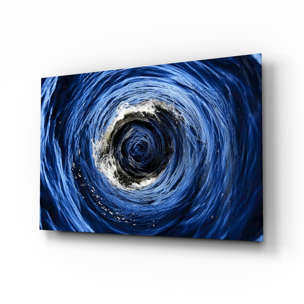 Ocean whirlpool vortex cinematic glass wall art above leather sofa in maritime study