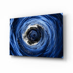 Ocean whirlpool vortex cinematic glass wall art above leather sofa in maritime study