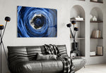 Top-down ocean whirlpool glass wall art in hospitality lobby
