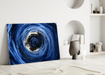 Atlantic spiral cinematic glass wall art over master-bedroom headboard