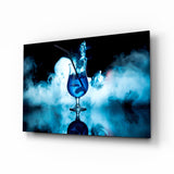 Blue cocktail smoke captured-fluid cinematic glass wall art above home bar back-counter