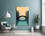 Golden-hour bridge cinematic glass wall art in boutique-hotel lobby