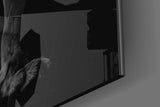 Stalking lion cinematic glass wall art in steakhouse private dining room