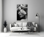 Helmut-Newton style cinematic glass wall art in heritage stairwell
