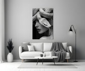 Helmut-Newton style cinematic glass wall art in heritage stairwell