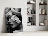 Stoic Medusa cinematic glass wall art in private library reading nook
