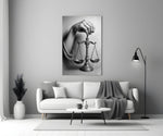 Bronze-scale-of-justice cinematic glass wall art in heritage stairwell