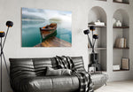 Wooden rowboat cinematic glass wall art in wellness retreat reception
