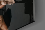 Goddess archetype cinematic glass wall art in wellness clinic
