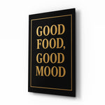 Good Food Good Mood gold cinematic glass wall art over walnut console in designer kitchen