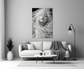 Helmut-Newton style cinematic glass wall art in heritage stairwell