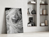 Veiled-portrait cinematic glass wall art in private library reading nook