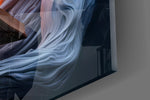 Smoke-figure reader cinematic glass wall art in private library