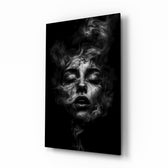 Smoldering smoke face cinematic glass wall art over walnut console in designer fashion atelier