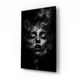 Smoldering smoke face cinematic glass wall art over walnut console in designer fashion atelier
