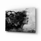Black white smoke hair muse cinematic glass wall art over walnut console in designer wellness clinic