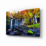 Shiraito autumn waterfall cinematic glass wall art over walnut console in designer hotel-resort lobby