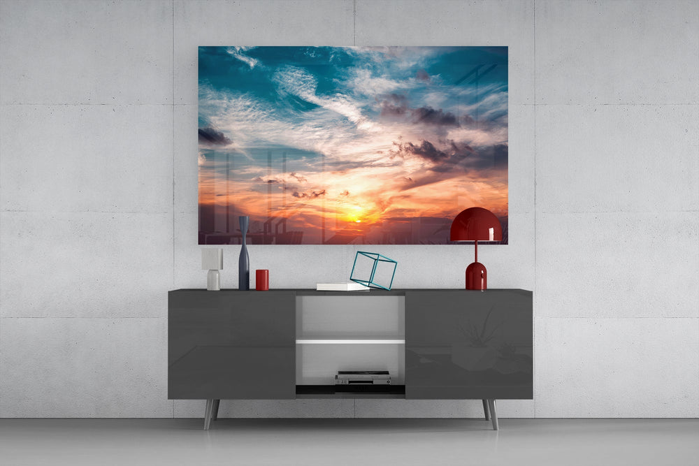 Cumulus sunset cinematic glass wall art in light-filled atelier