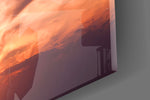Cobalt-and-tangerine sky cinematic glass wall art in heritage living room