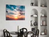 Painterly clouds cinematic glass wall art over modern dining sideboard