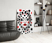 Red-and-black dots cinematic glass wall art over modern dining sideboard